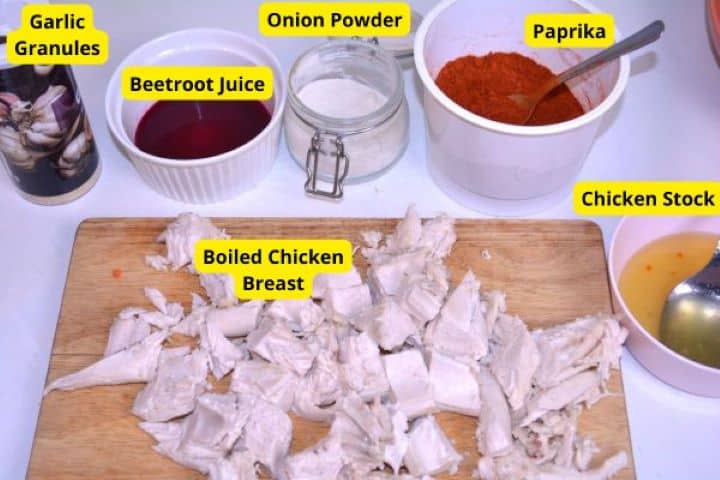 Ingredients Ingredients for chicken salami paste including diced cooked chicken, sweet paprika, ground nutmeg, gelatin, chicken stock, and fresh beetroot juice.