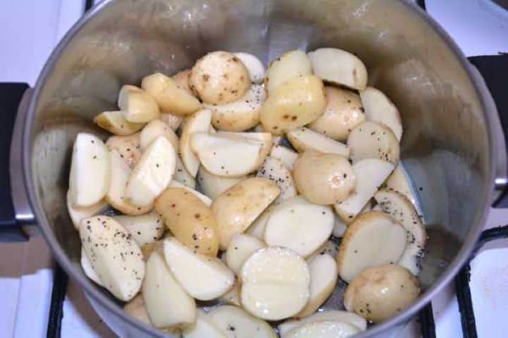 Frying Frying Cut Baby Potatoes in the Pot
