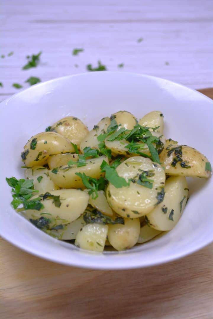 Served Hungarian Parsley Potatoes Served in the Bowl With More Chopped Parsley