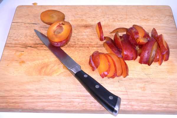 Puff Pastry Plum Tart-Sliced Plums on Chopping Board