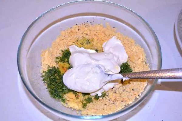Deviled Eggs Without Vinegar-Sour Cream and Dill on the Filling in the Bowl
