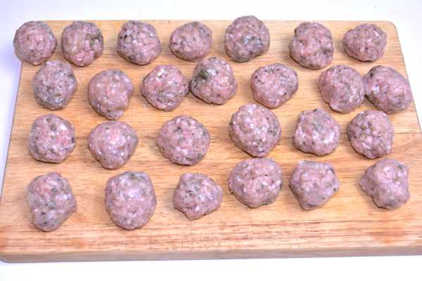 Romanian Meatball Soup-Pork Meatballs on the Chopping Board