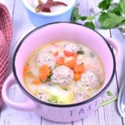 Romanian Meatball Soup Served Hot In Little Pot With Pickled Chili