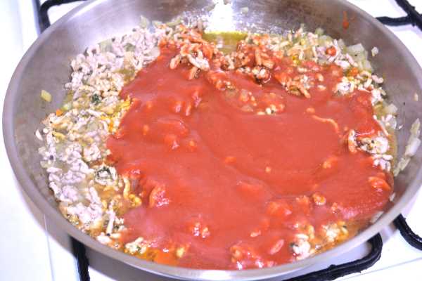 Turkish Moussaka- Tomato Passata on the Frying Pork Mince