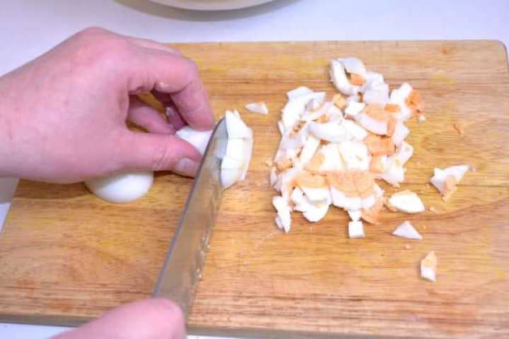 Eggs Dicing peeled hard-boiled eggs into small cubes for the turkey meatloaf filling.