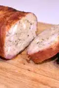 Bacon-Wrapped Turkey Meatloaf-Sliced on the Chopping Board