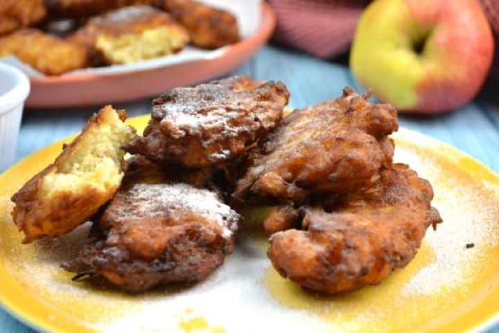Easy no-yeast grated apple fritter showing craggy crispy edges and a tender spiced apple center.