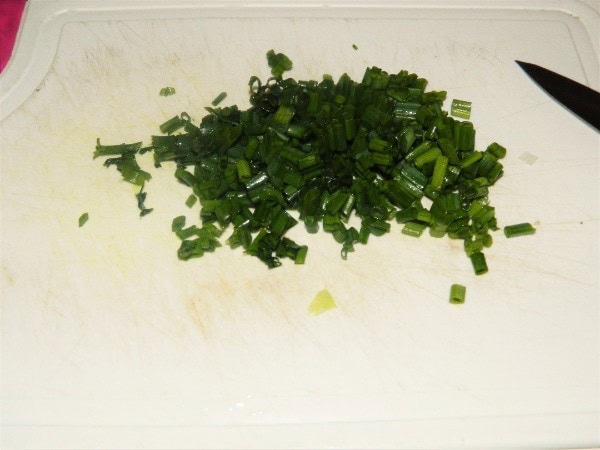 Chopped Chives on Cutting Board