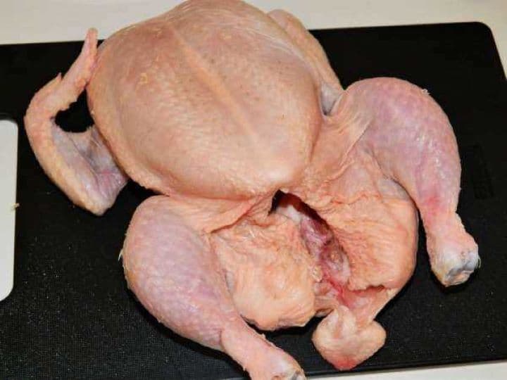 Whole Raw Chicken on the Table