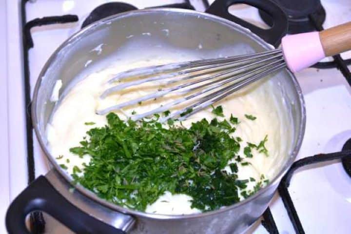 seasoning Adding chopped fresh parsley, chives, and thyme into warm melted cheese spread.