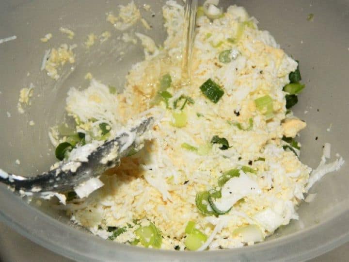 Mixing egg salad Mixing the No Mayo Egg Salad in the Bowl
