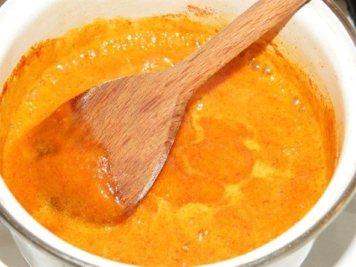Boiling roux with paprika Boiling Roux With Paprika Powder in the Saucepan