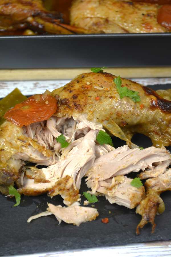 Slow Roasted Turkey Legs-Pulled and Served on Black Platter