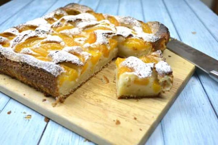 Old Fashioned Transylvanian Peach Cake Served on Wooden Cutting Board