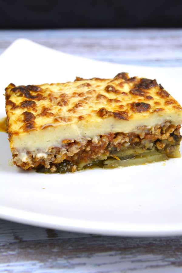 Greek Moussaka With Eggplant and Potatoes-Moussaka Slice Served on the Plate
