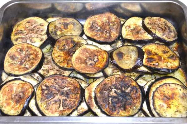 Greek Moussaka With Eggplant and Potatoes-Roasted Eggplant Slices in the Baking Tray