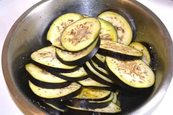 Greek Moussaka With Eggplant and Potatoes-Seasoned Sliced Eggplants in the Bowl
