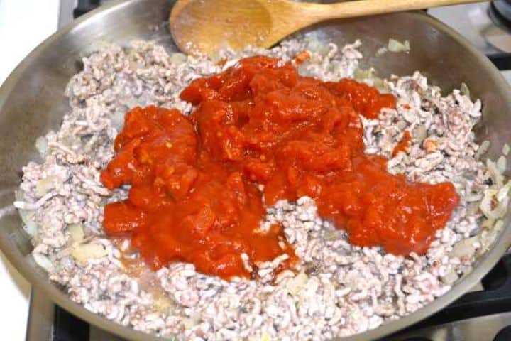 Chopped Tomatoes on Frying Lamb Mince in the Pan