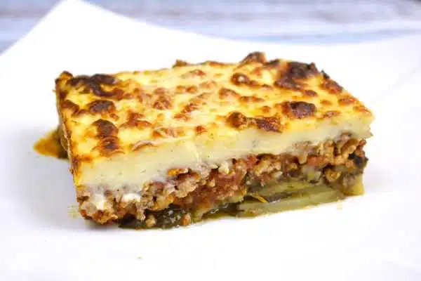 Greek Moussaka With Eggplant and Potatoes-Moussaka Slice Served on Plate