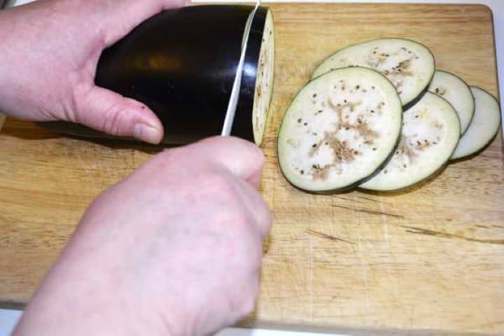Slicing Eggplant on the Chopping Board