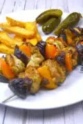 Oven Cooked Chicken Kebabs-Served on Plate With Fries