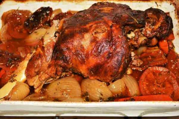 Slow Roasted Leg of Lamb Recipe-Ready to Serve Fall-apart tender leg of lamb fresh out of the oven, covered in aromatic juices and herbs.