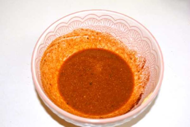 Sweet and savory soy garlic honey glaze whisked smoothly in a bowl.
