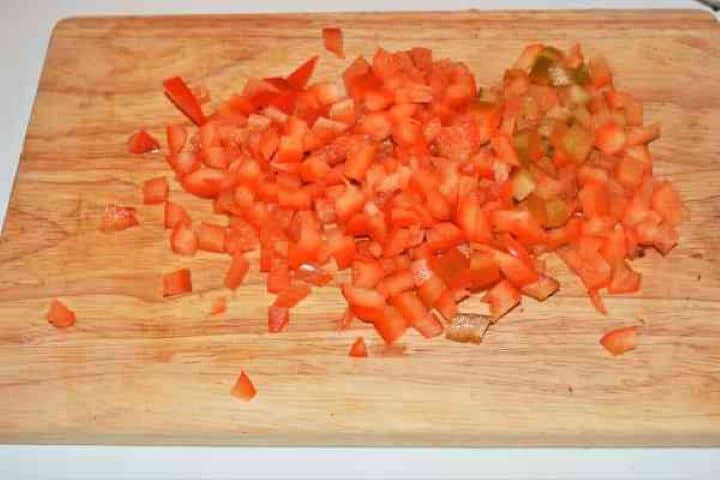 Best Mushroom Soup Recipe-Chopped Red Bell Pepper Finely diced sweet red bell pepper on a cutting board.