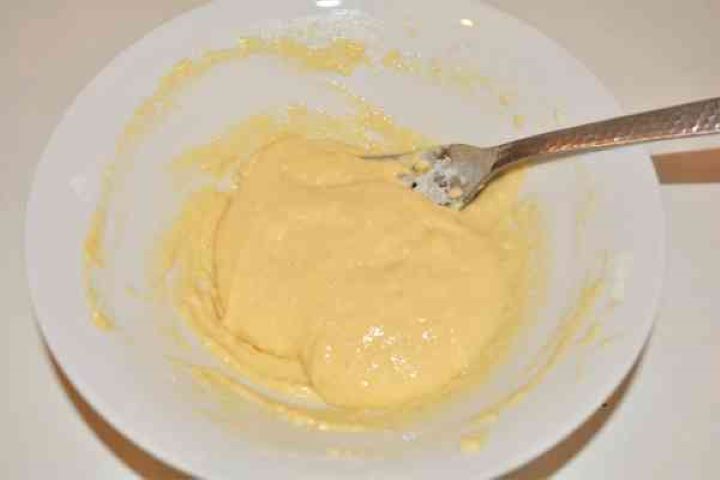 Best Mushroom Soup Recipe-Egg and Flour Batter Whisking fresh egg and wheat flour in a glass bowl to make quick nokedli dumpling batter.