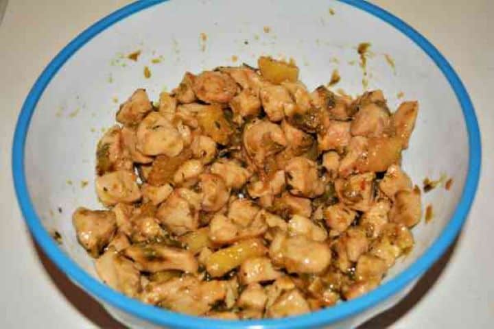 Chicken Breast With Pineapple-Fried Chicken Breast in the Bowl Transferring cooked chicken and pineapple mixture into a wide bowl to cool completely to room temperature.