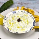 Authentic Greek Tzatziki Sauce Recipe-Served on Plate With Fries and Peppers