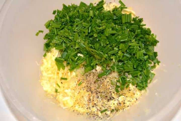 Butter and Herbs Adding chopped parsley, chives, and garlic to softened butter.