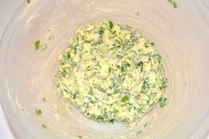 Butter Mix Smooth garlic lemon herb butter paste mixed thoroughly in a bowl.