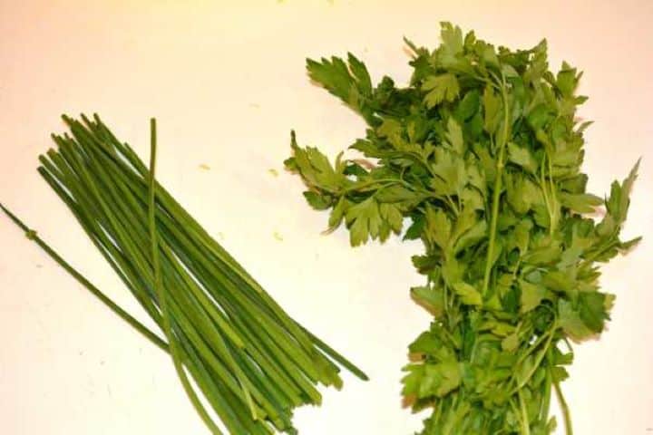 Herbs Fresh parsley and chives for garlic lemon herb butter paste.