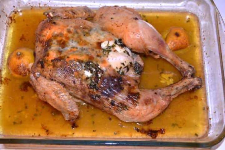 Roasted Golden crispy spatchcock garlic butter roast chicken fresh out of the oven.