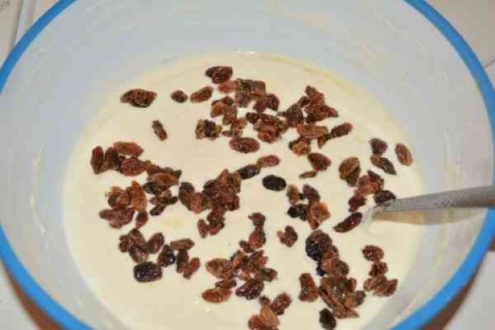 Noodle Kugel With Raisins-Raisins Over the Mixed Cheese Cream in the Bowl Raisins Over the Mixed Cheese Cream in the Bowl