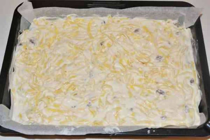 Noodle Kugel With Raisins-Tagliatelle and Cheese Mix in the Baking Tray Ready to Bake Tagliatelle and Cheese Mix in the Baking Tray Ready to Bake