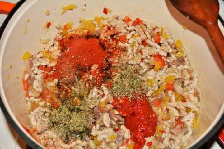 Seasoning ground pork with Hungarian sweet paprika, pepper paste, oregano, and marjoram.