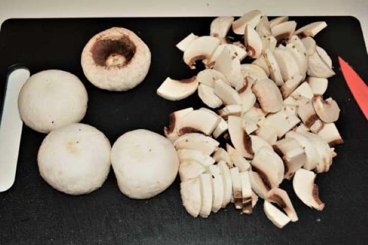 Freshly sliced cremini mushrooms for ground pork pasta sauce.