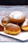 Perfect Yeast Doughnuts Served on Plate With Strawberry Jam