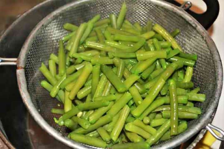 Green Bean Salad With Garlic Cream-Boiled Green Beans in the Sieve Boiled Green Beans in the Sieve