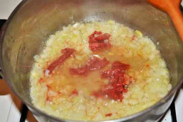 Tomato Puree Adding tomato paste to sautéed onions in olive oil to bloom flavor.