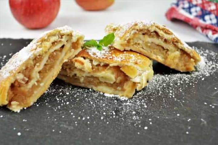 Apple Shortcrust Pastry Recipe-Served on the Platter With Icing Sugar Apple Shortcrust Pastry Roll Slices Served on the Platter With Icing Sugar
