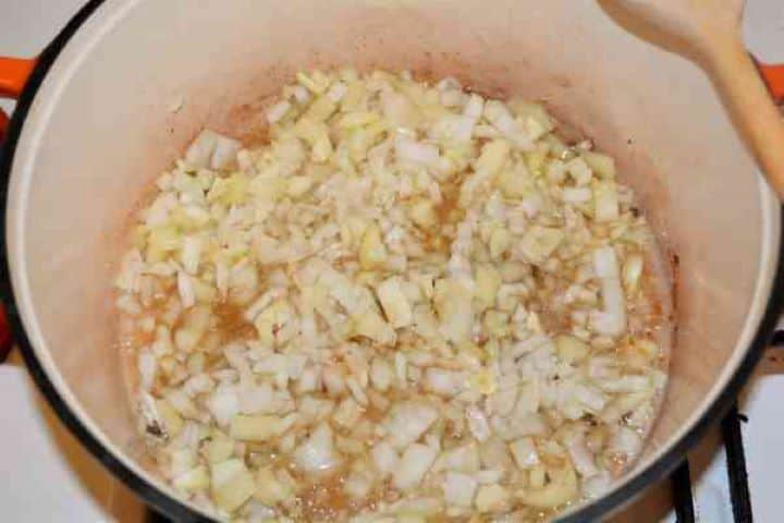 Dutch Oven Beef Stew-Frying Chopped Onion, Pepper and Garlic in the Dutch Oven Frying Chopped Onion, Pepper and Garlic in the Dutch Oven