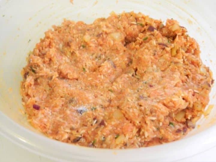 A fully combined, homogeneous ground meat and rice filling for the stuffed collard greens recipe.