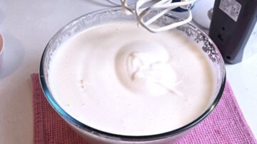 Thick, pale egg and sugar foam whipped to high volume for a flexible chocolate sponge.