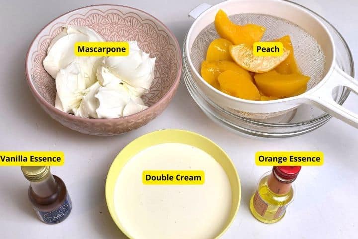 Ingredients for peach mascarpone cake roll filling featuring mascarpone cheese, heavy cream, and diced peaches.