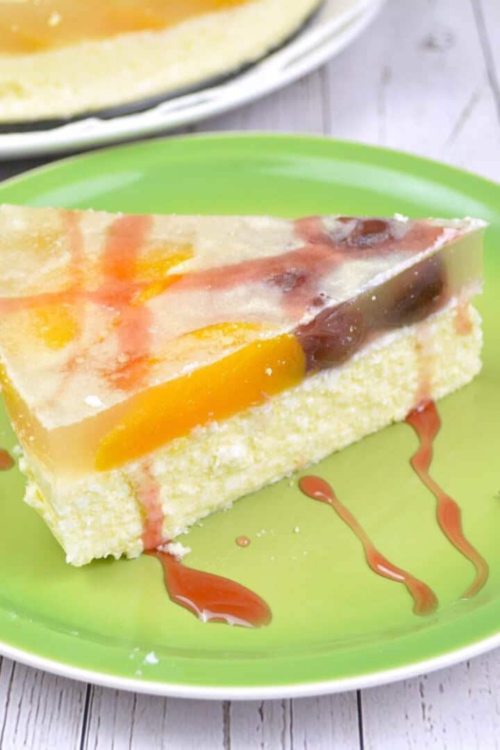 No Bake Crustless Cheesecake Slice Served on Green Plate With Strawberry Syrup
