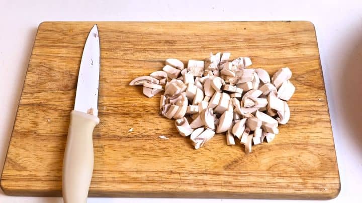 Chopped Mushrooms on the Cutting Board