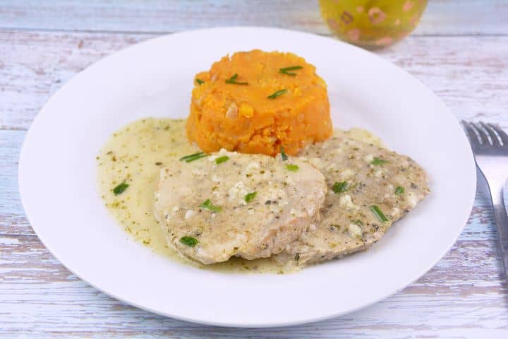 Creamy Garlic Pork Chops Served on Plate